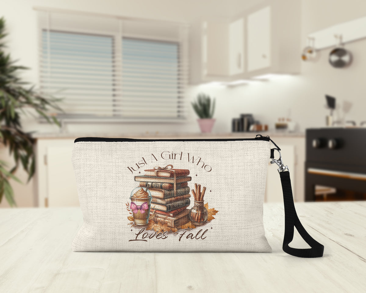 Just a Girl Who Loves Fall Makeup Bag on a kitchen counter