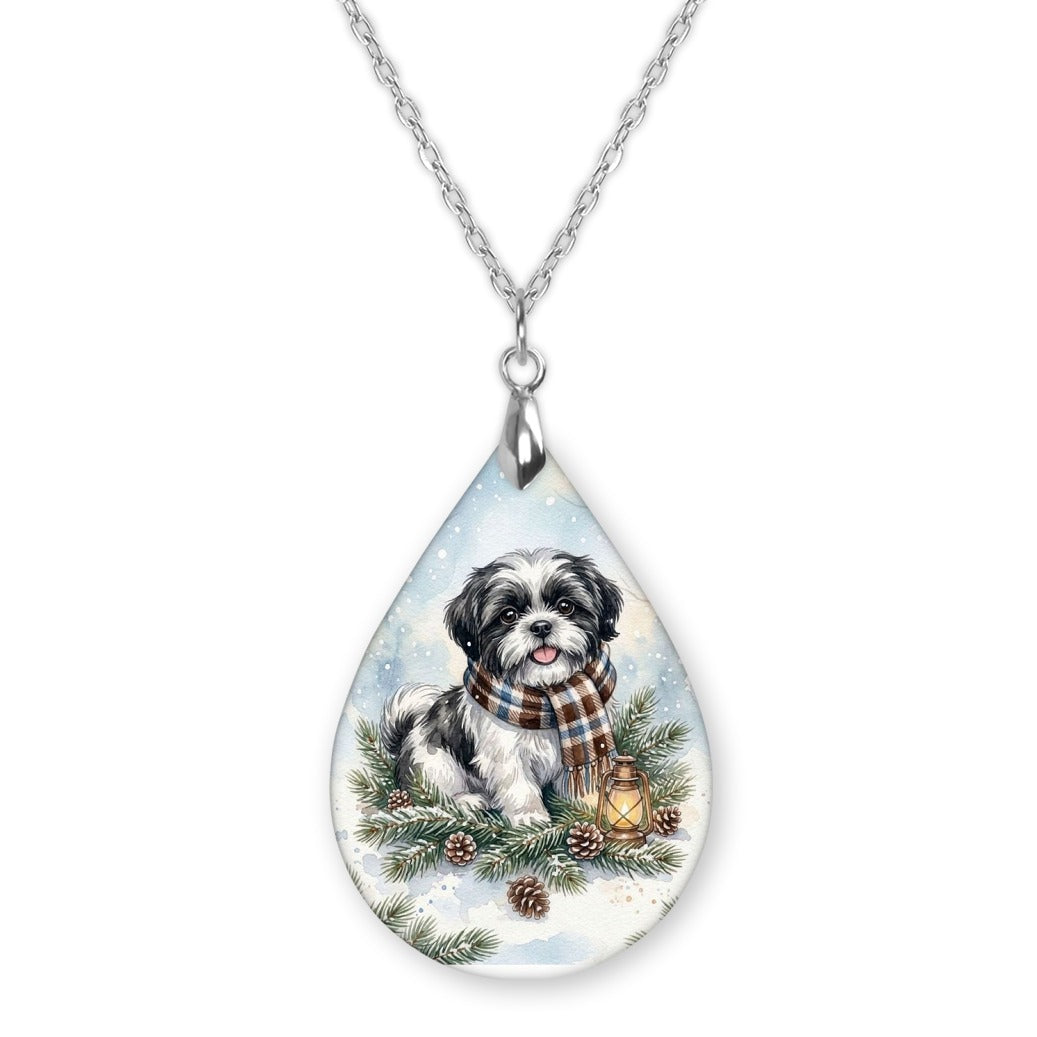 Black and White Shih Tzu Winter Woodland teardrop pendant necklace on a silver-tone chain
