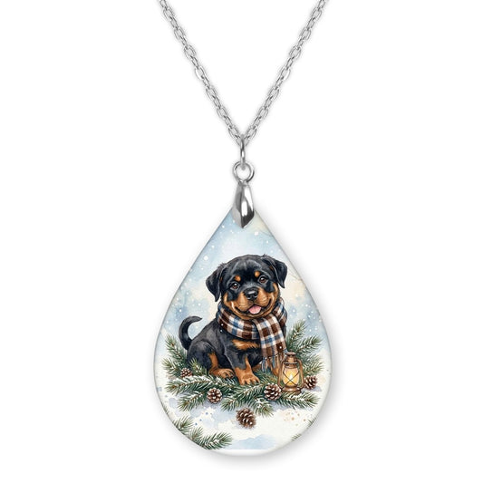 Rottweiler Winter Woodland teardrop pendant necklace on a silver-tone chain