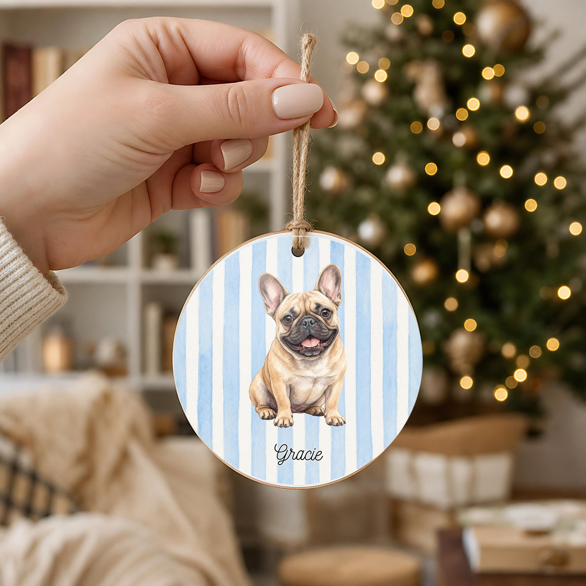 Personalized French Bulldog ornament held in hand to show its 3 inch size