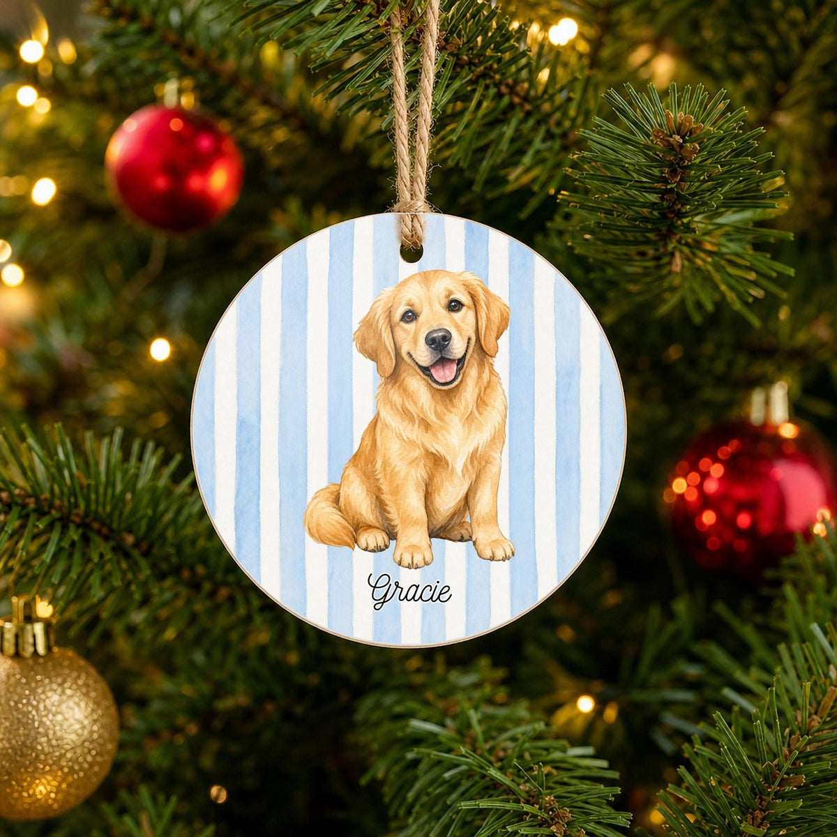 Personalized Golden Retriever Christmas ornament with custom name hanging on a Christmas tree