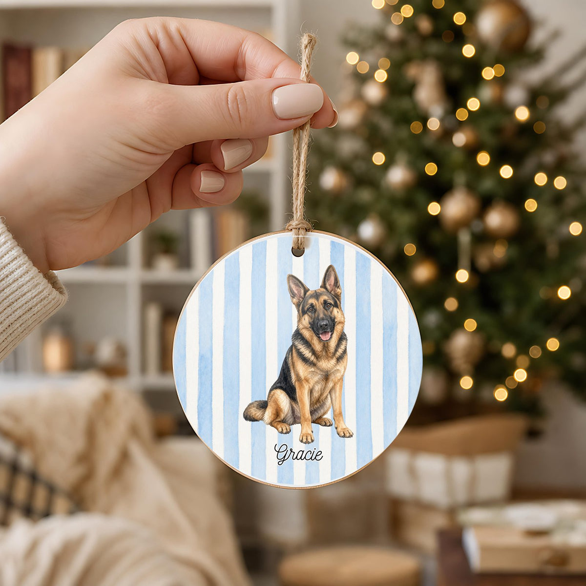 Personalized German Shepherd ornament held in hand to show its 3 inch size
