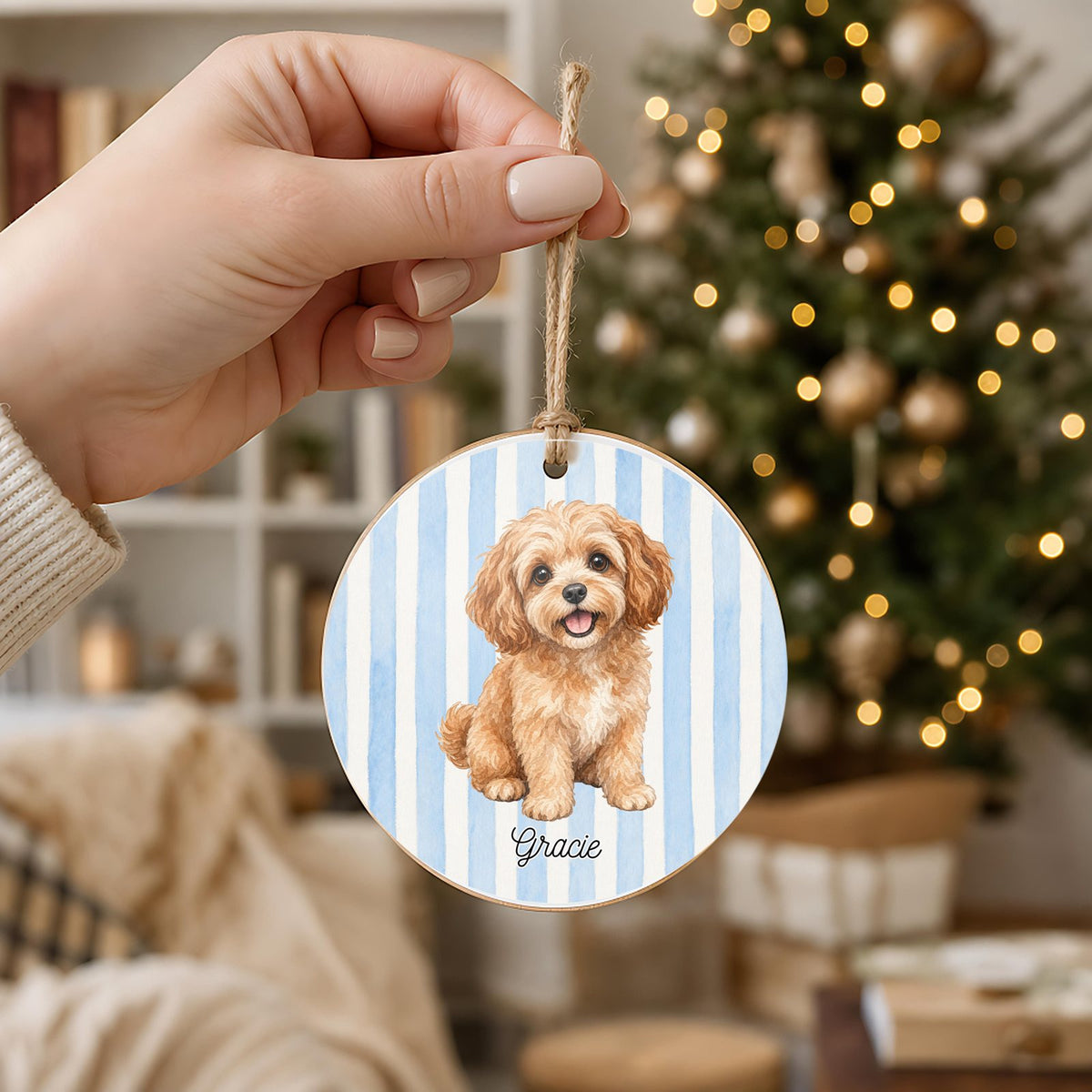 Personalized Cavapoo ornament held in hand to show its 3 inch size
