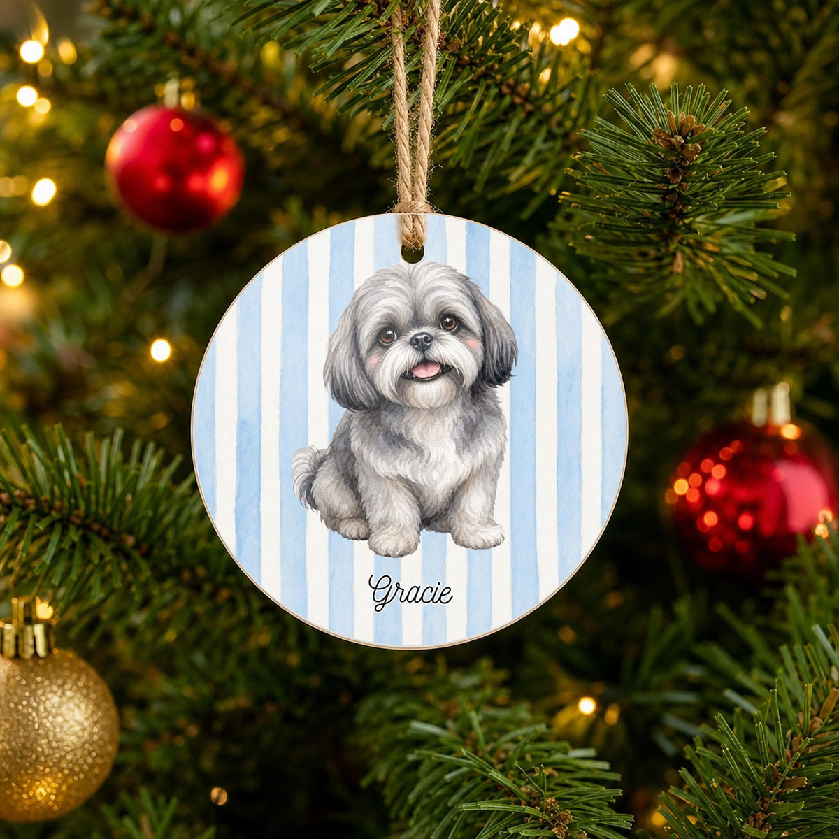 Personalized Gray Shih Tzu Christmas ornament with custom name hanging on a Christmas tree