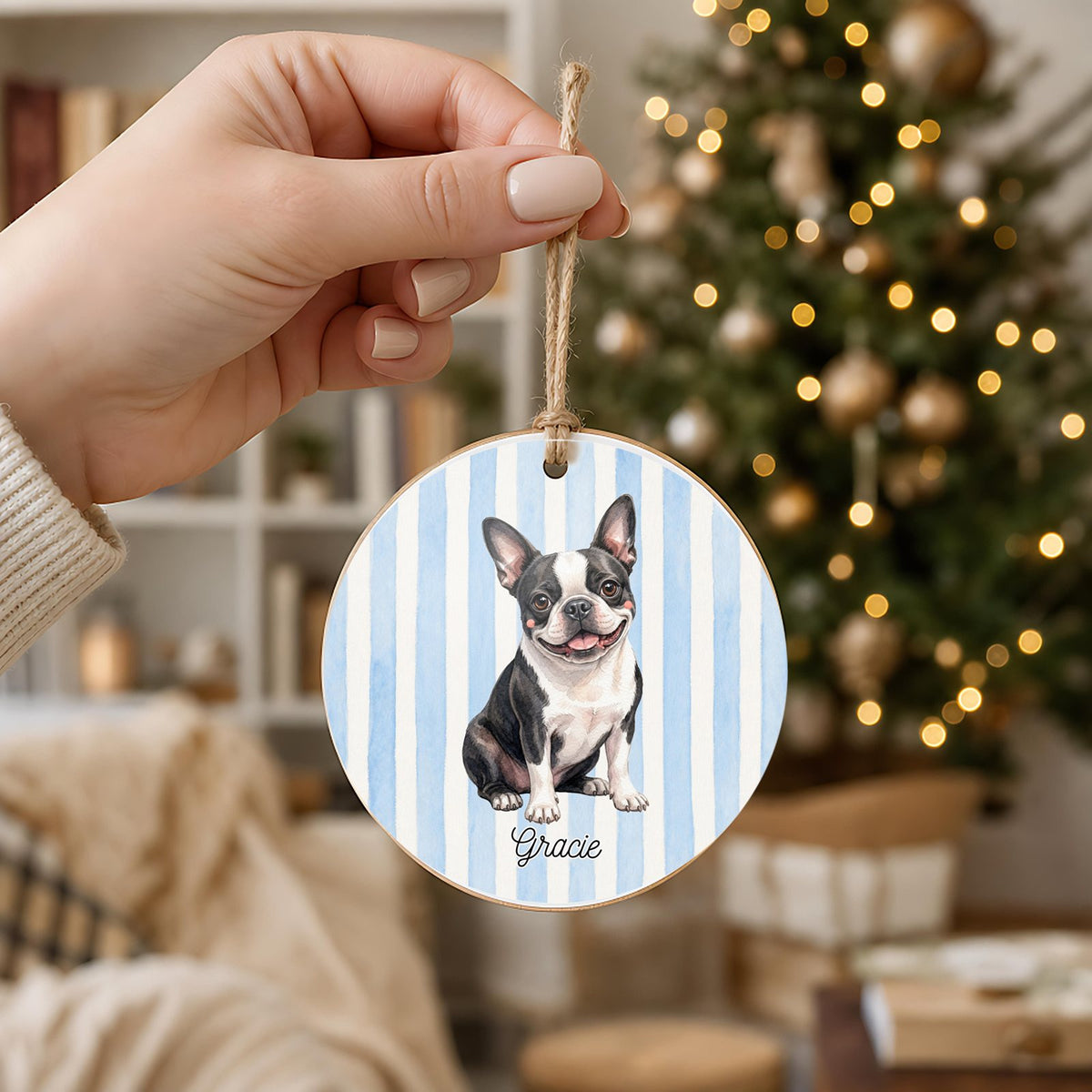Personalized Boston Terrier ornament held in hand to show its 3 inch size