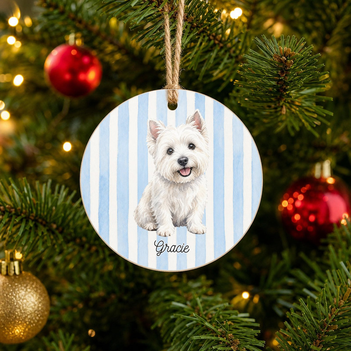 Personalized Westie Christmas ornament with custom name hanging on a Christmas tree