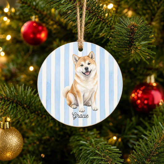 Personalized Akita Christmas ornament with custom name hanging on a Christmas tree
