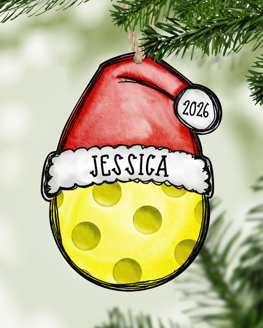 Personalized pickleball Christmas ornament hanging on a Christmas tree - The Painted Pug