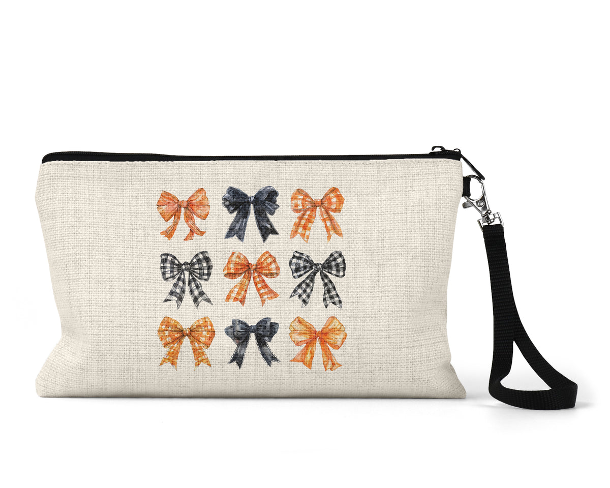 Orange and Black Bows Makeup Bag front view on a white background