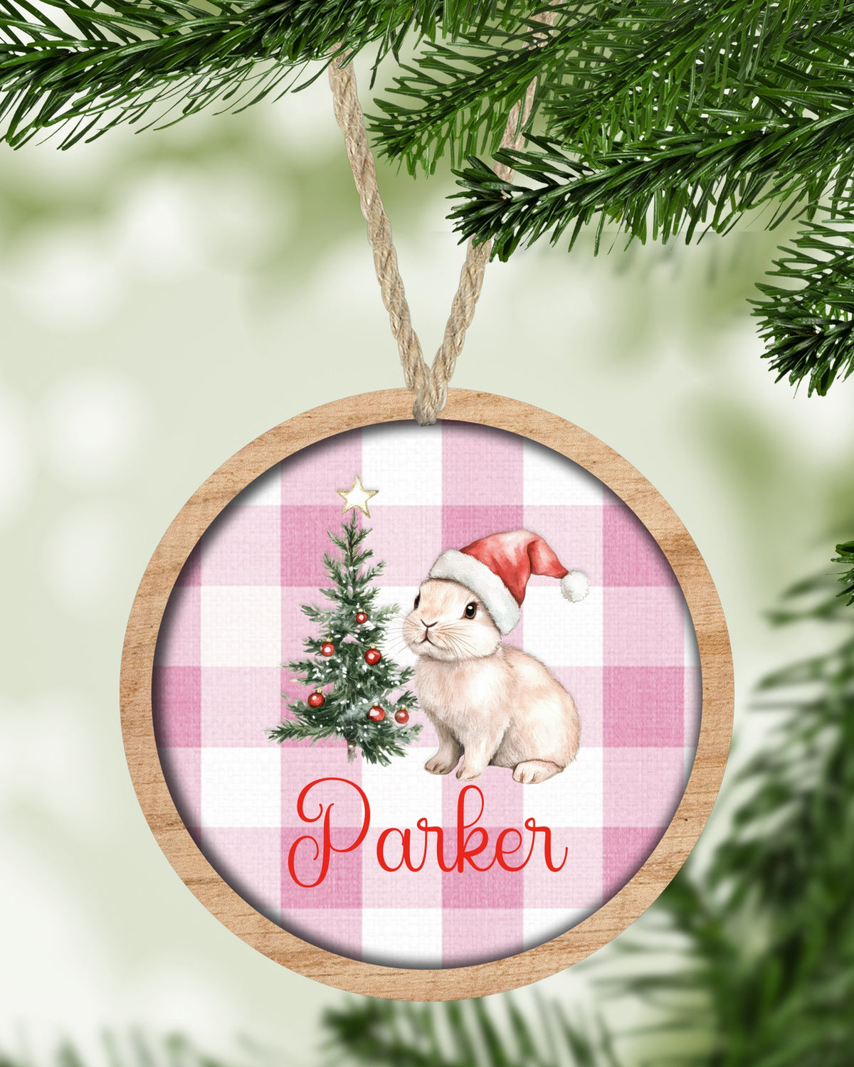 Bunny 1 Christmas ornament hanging on a Christmas tree - The Painted Pug