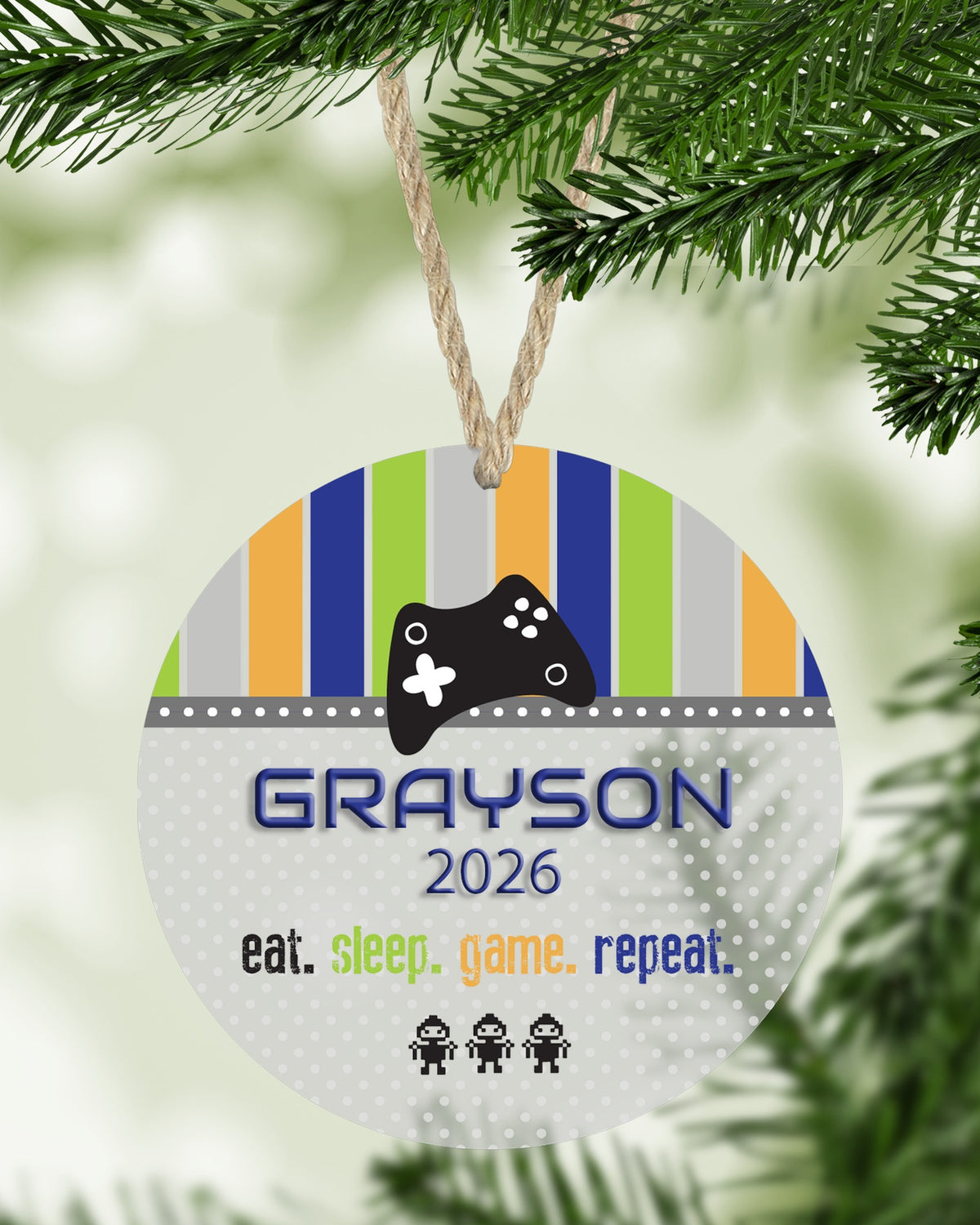 Gamer Blue Green Christmas ornament hanging on a Christmas tree - The Painted Pug
