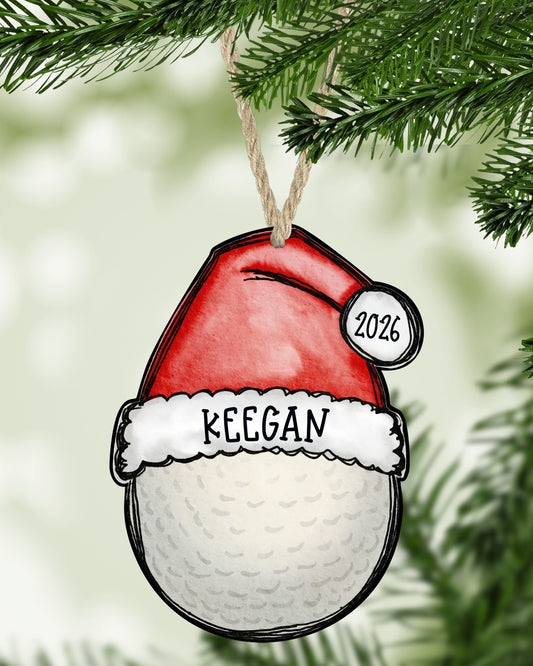 Golf Christmas ornament hanging on a Christmas tree - The Painted Pug
