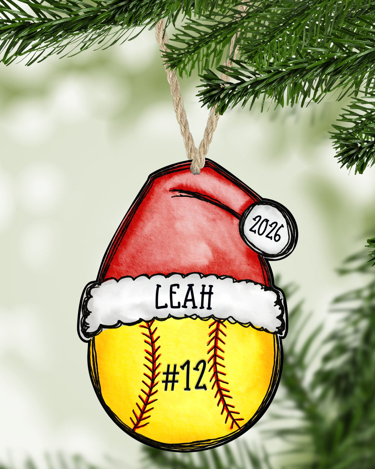 Softball 2026 Christmas ornament hanging on a Christmas tree - The Painted Pug