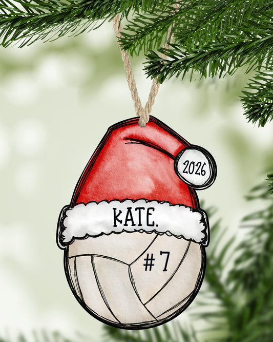 Volleyball Christmas ornament hanging on a Christmas tree - The Painted Pug