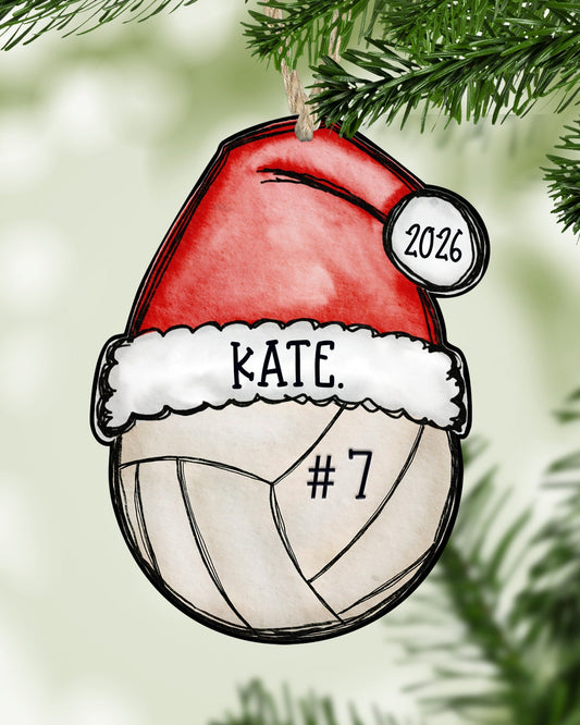Personalized volleyball Christmas ornament hanging on a Christmas tree - The Painted Pug