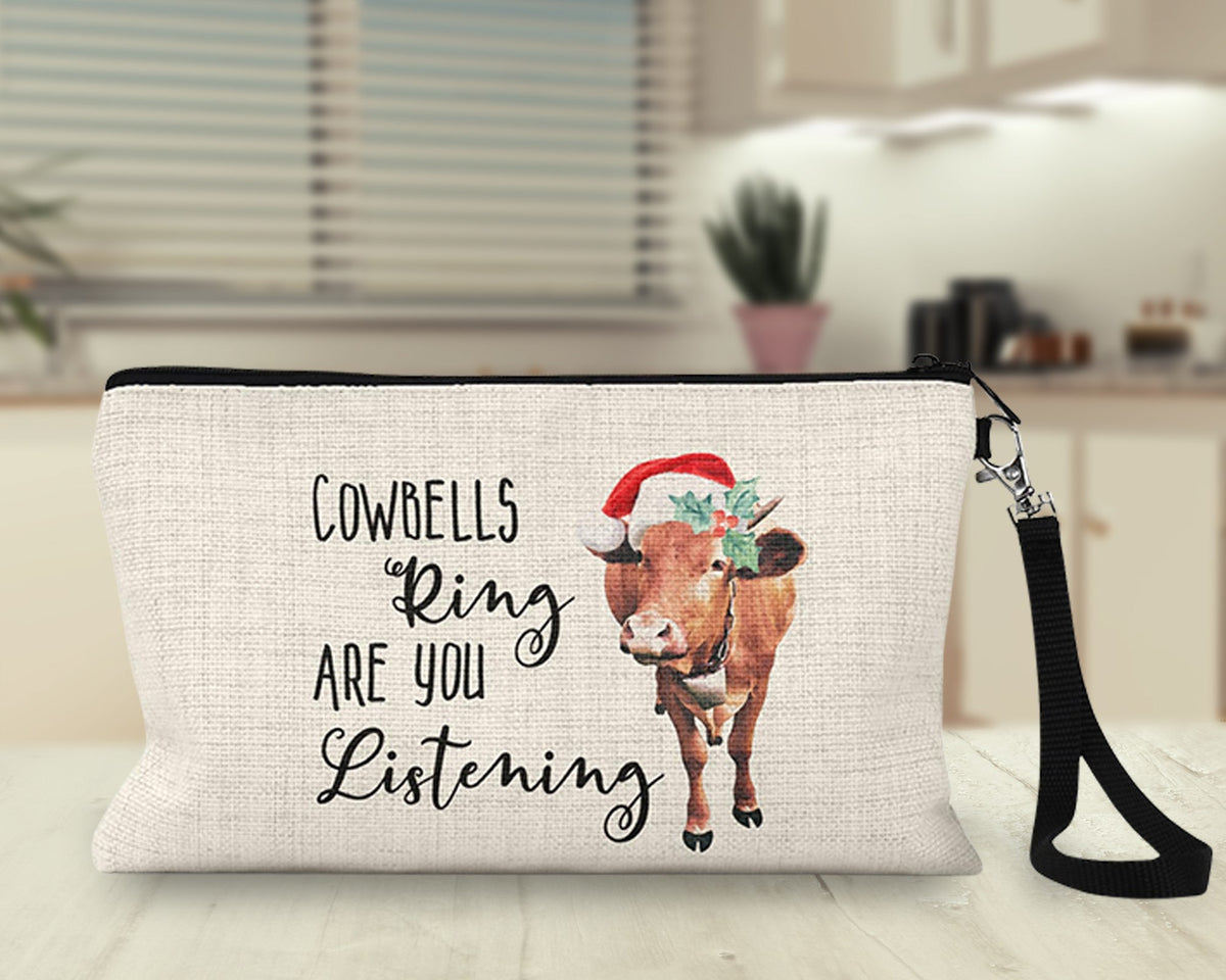 Cowbells Ring Are You Listening Christmas cow Makeup Bag on a kitchen counter