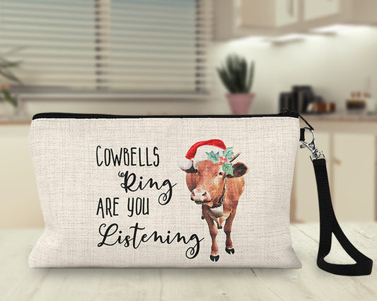 Cowbells Ring Are You Listening Christmas cow Makeup Bag on a kitchen counter