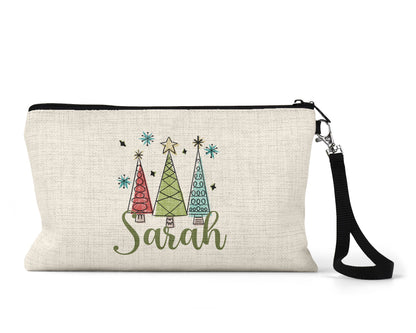 Personalized retro Christmas trees Makeup Bag front view on a white background