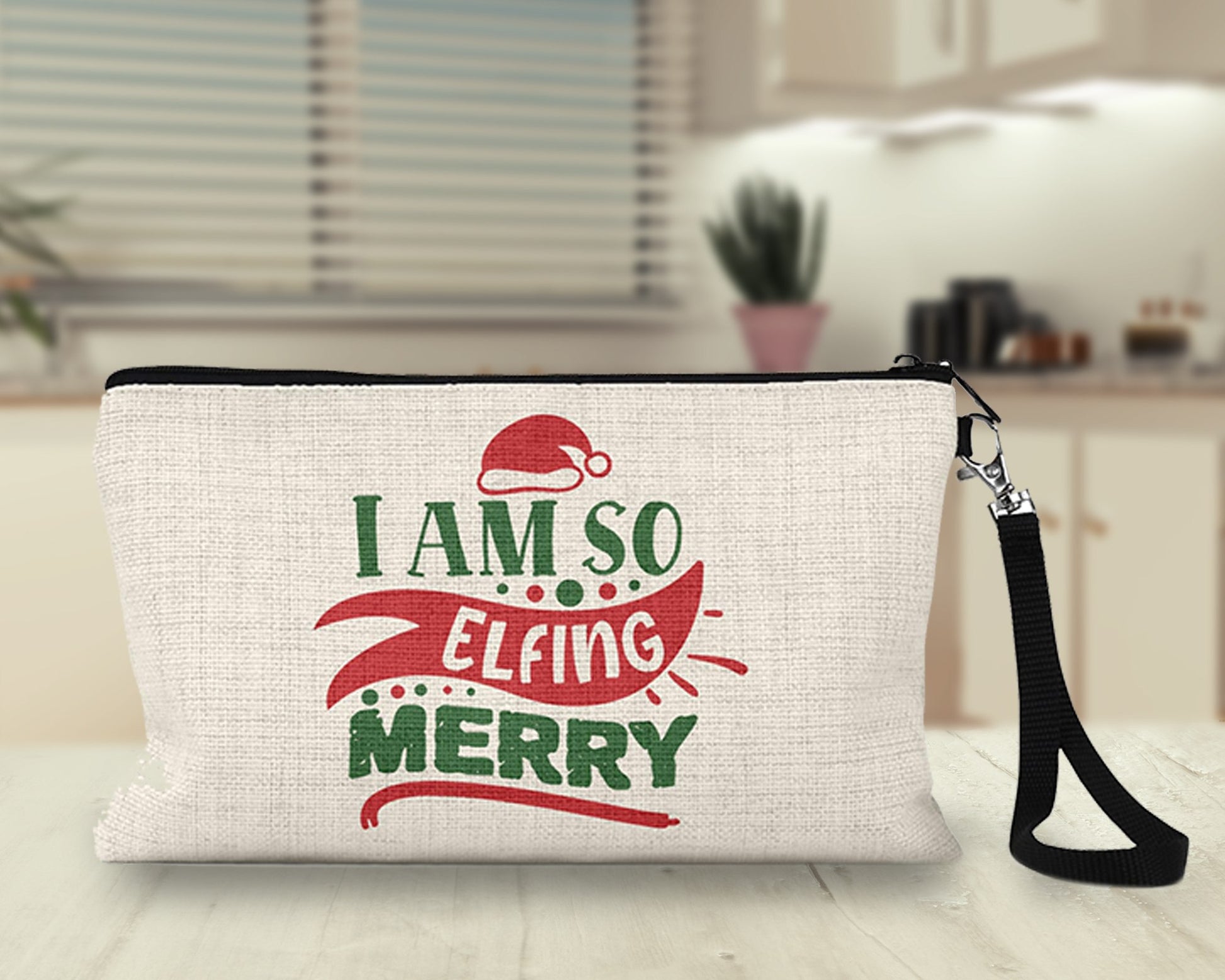 I Am So Elfing Merry Makeup Bag on a kitchen counter