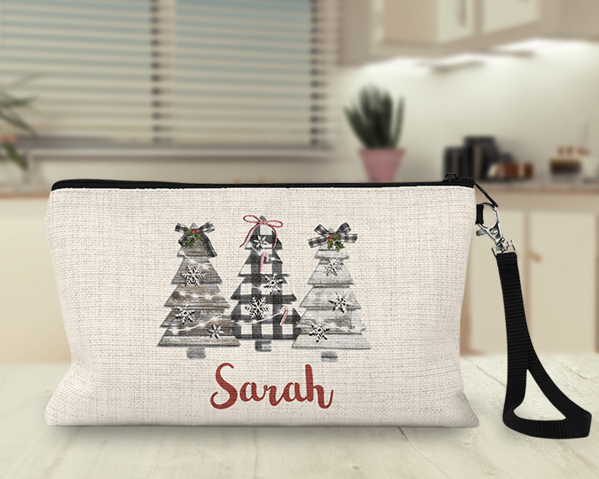 Personalized plaid Christmas trees Makeup Bag on a kitchen counter
