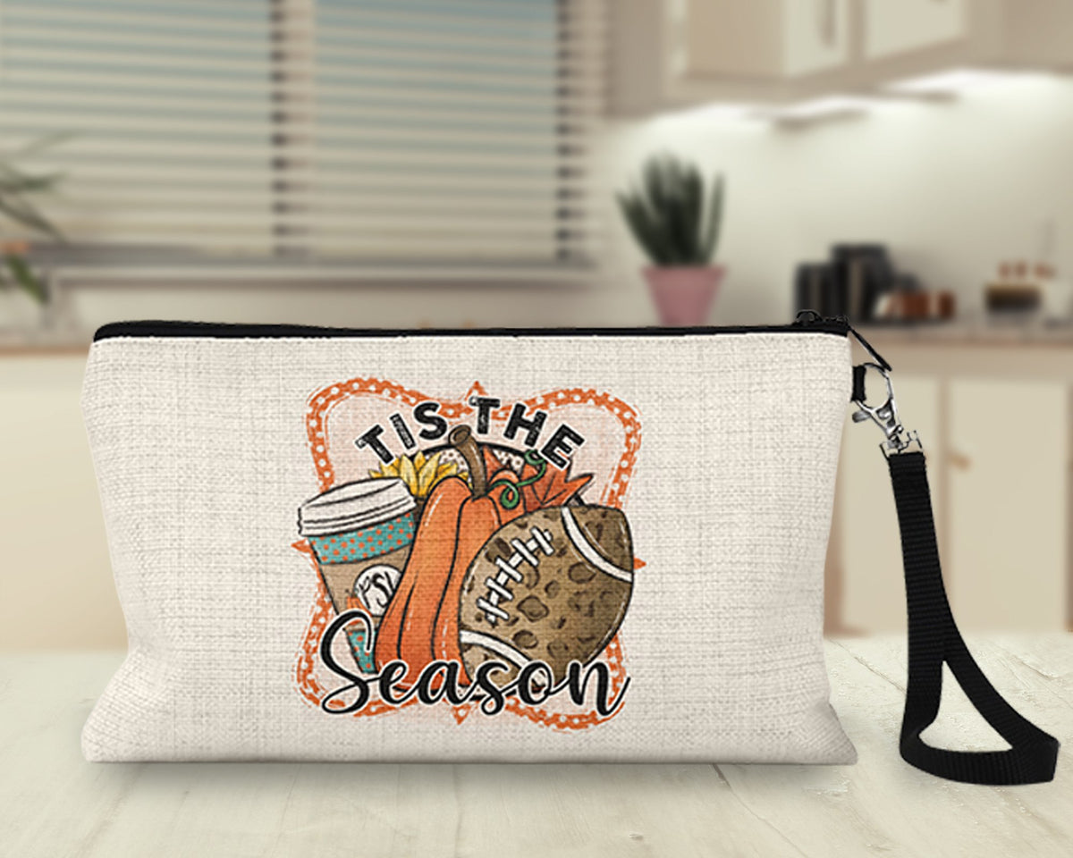 Tis the Season pumpkin latte and football Makeup Bag on a kitchen counter