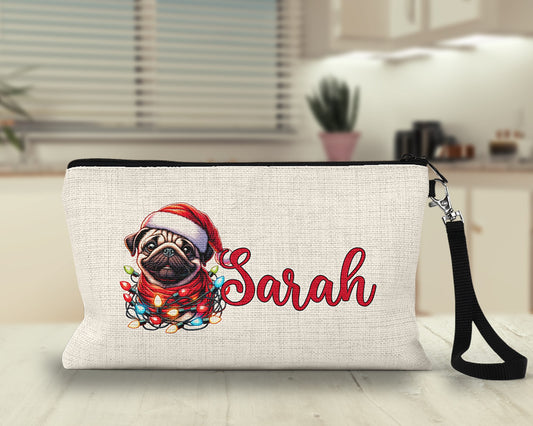 Personalized Christmas pug Makeup Bag on a kitchen counter