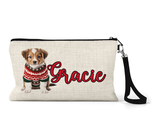 Personalized Christmas puppy sweater Makeup Bag front view on a white background